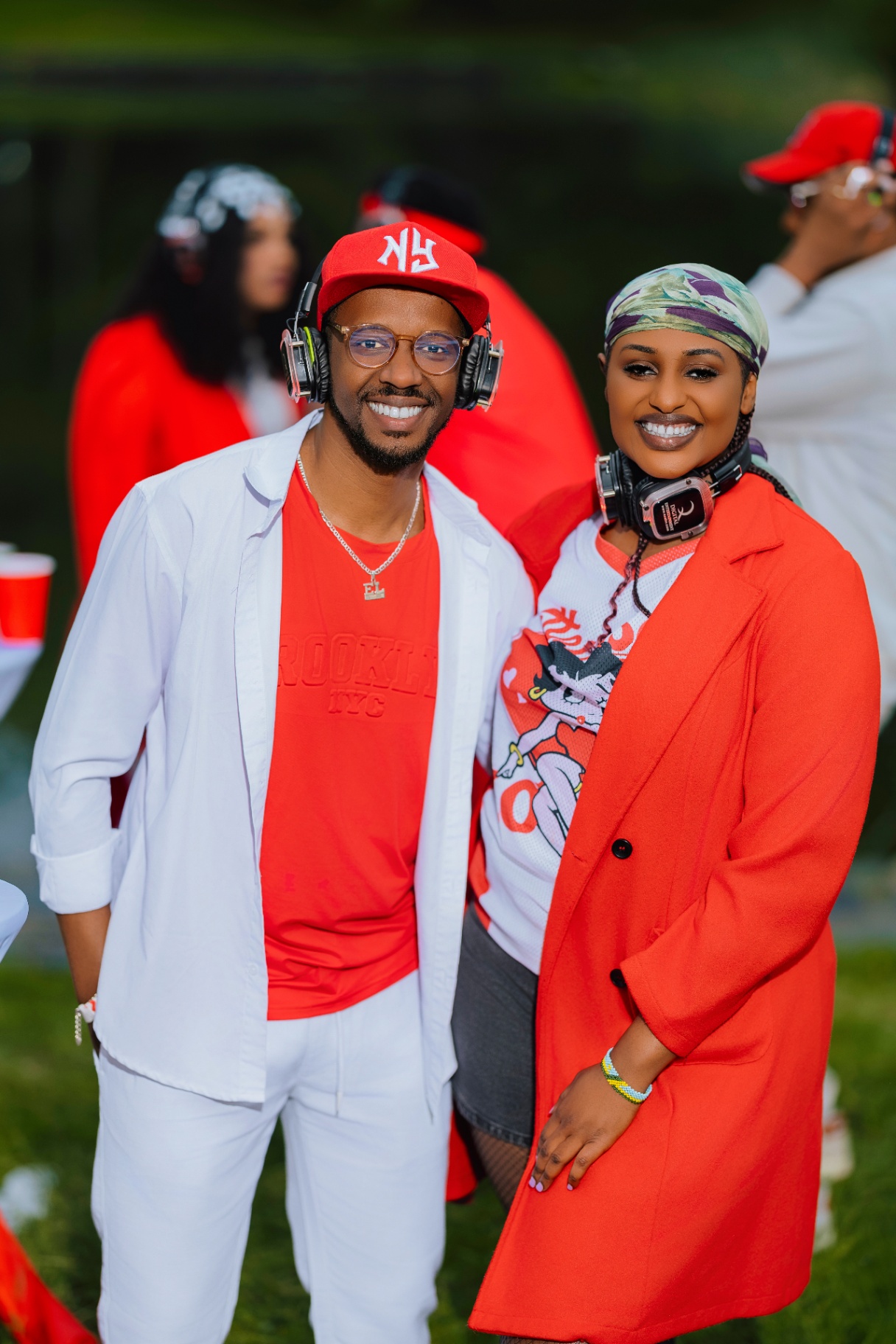 Couple in coordinated red and white at the lakeside